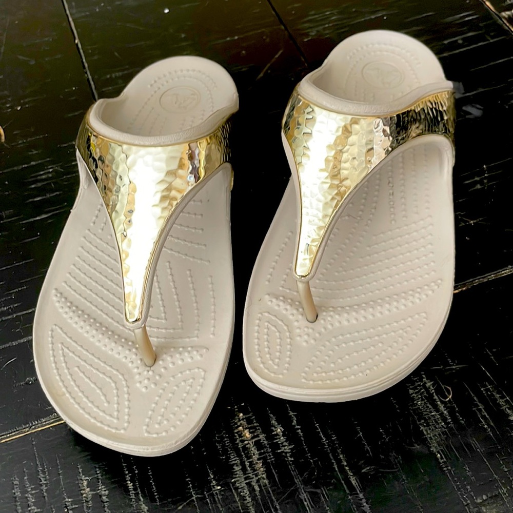 Crocs- women’s size 9, grey soles, gold upper,  very gently used, 1x.
